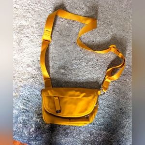 Lululemon micro mini festival bag in bright yellow. NWOT